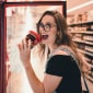 The girl bites the ice cream